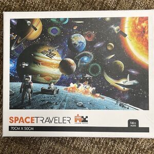 Space traveler puzzle.  1000 pieces.  Thick interlocking pieces.